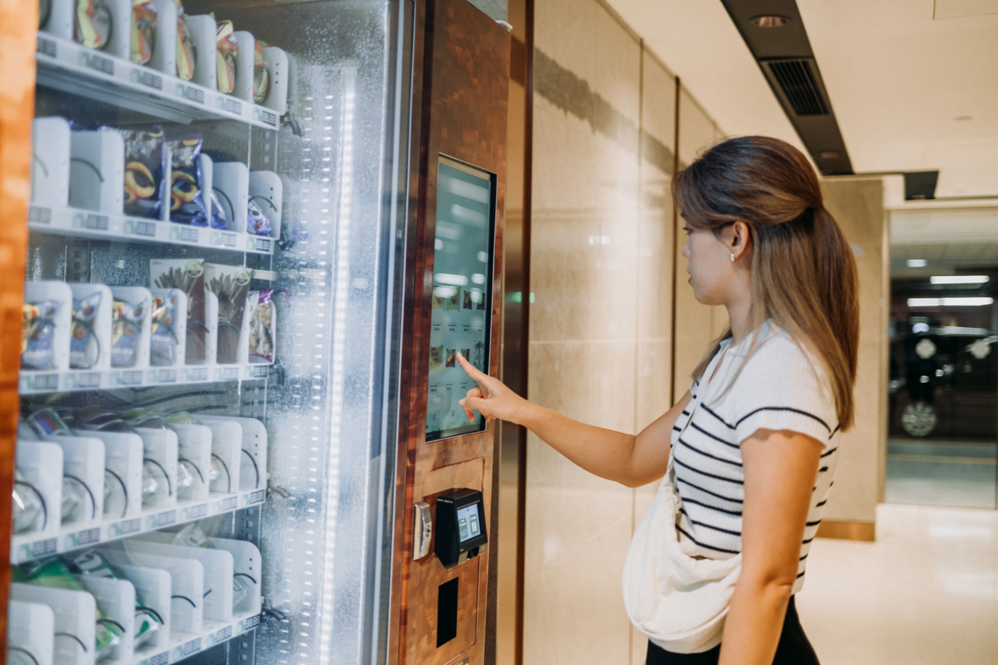 Vending machine being installed in a modern apartment building