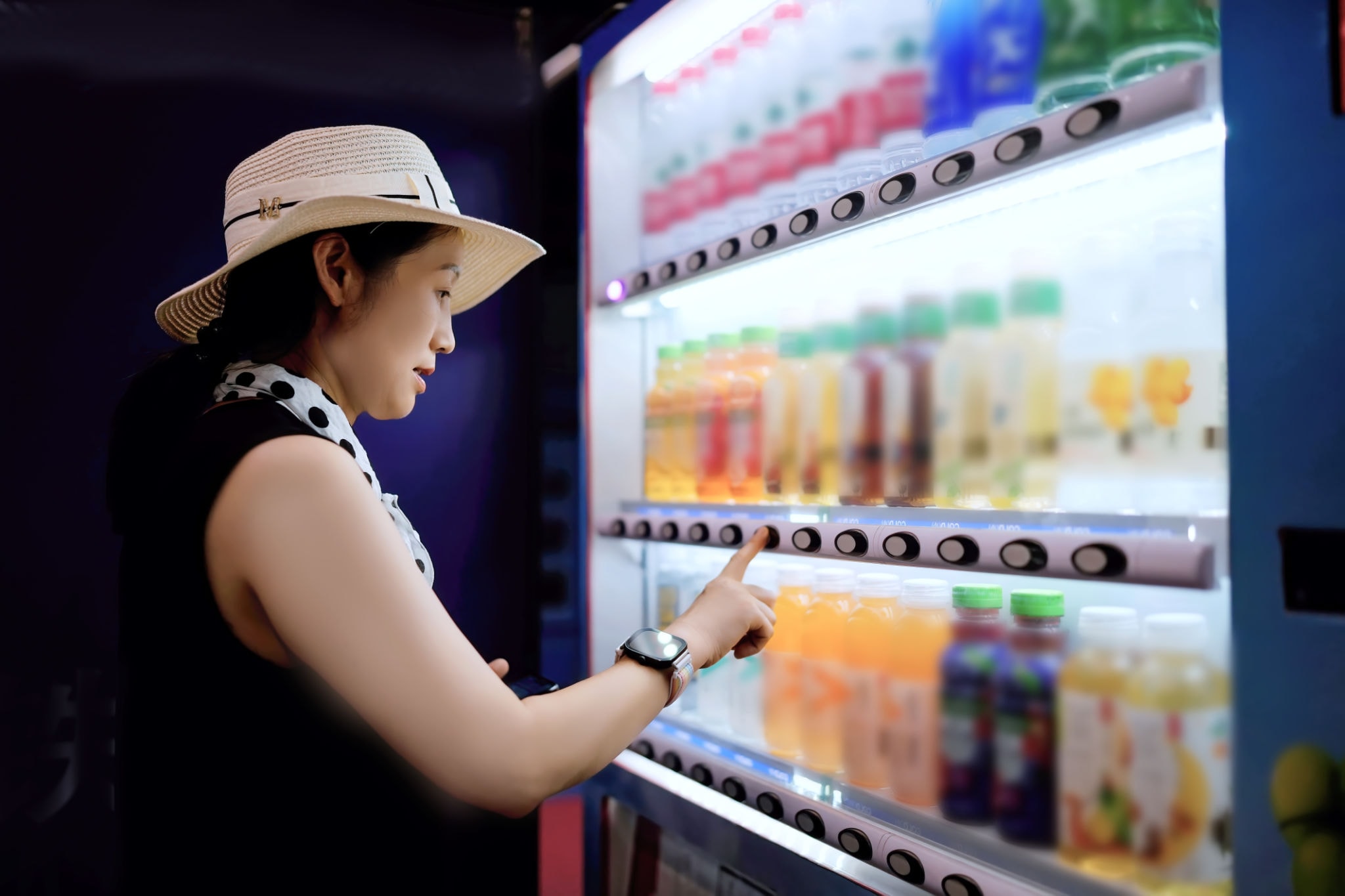 Colorful selection of healthy snacks and beverages in a vending machine